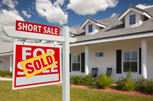 Short sale sold home sign lawn house
