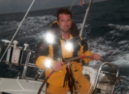 Chris at the Helm Sailing in the Newport to Bermuda Race